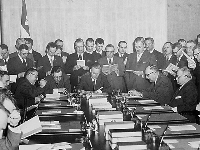 Jean Lesage and Labour Minister René Hamel surrounded by members of the FTQ delegation headed by their president, Roger Provost